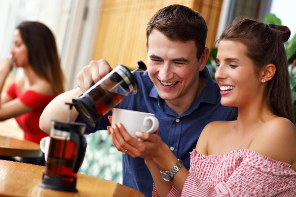 cute couple drinking black tea