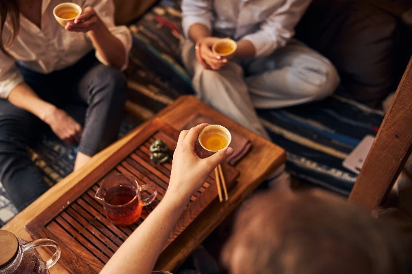 group of friends drinking tea